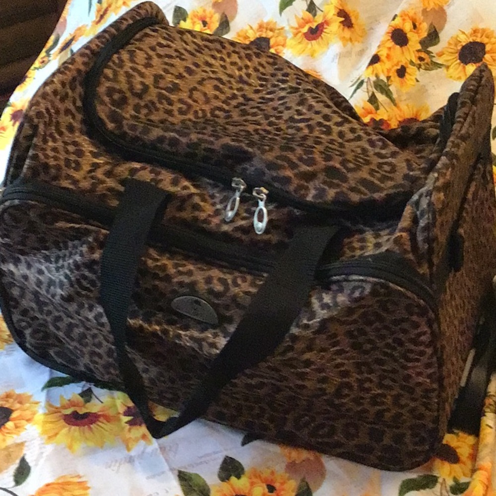 American Flyer Cheetah Brown Rolling Duffel Bag Front Zip Pocket 18”Lx11”W x18H